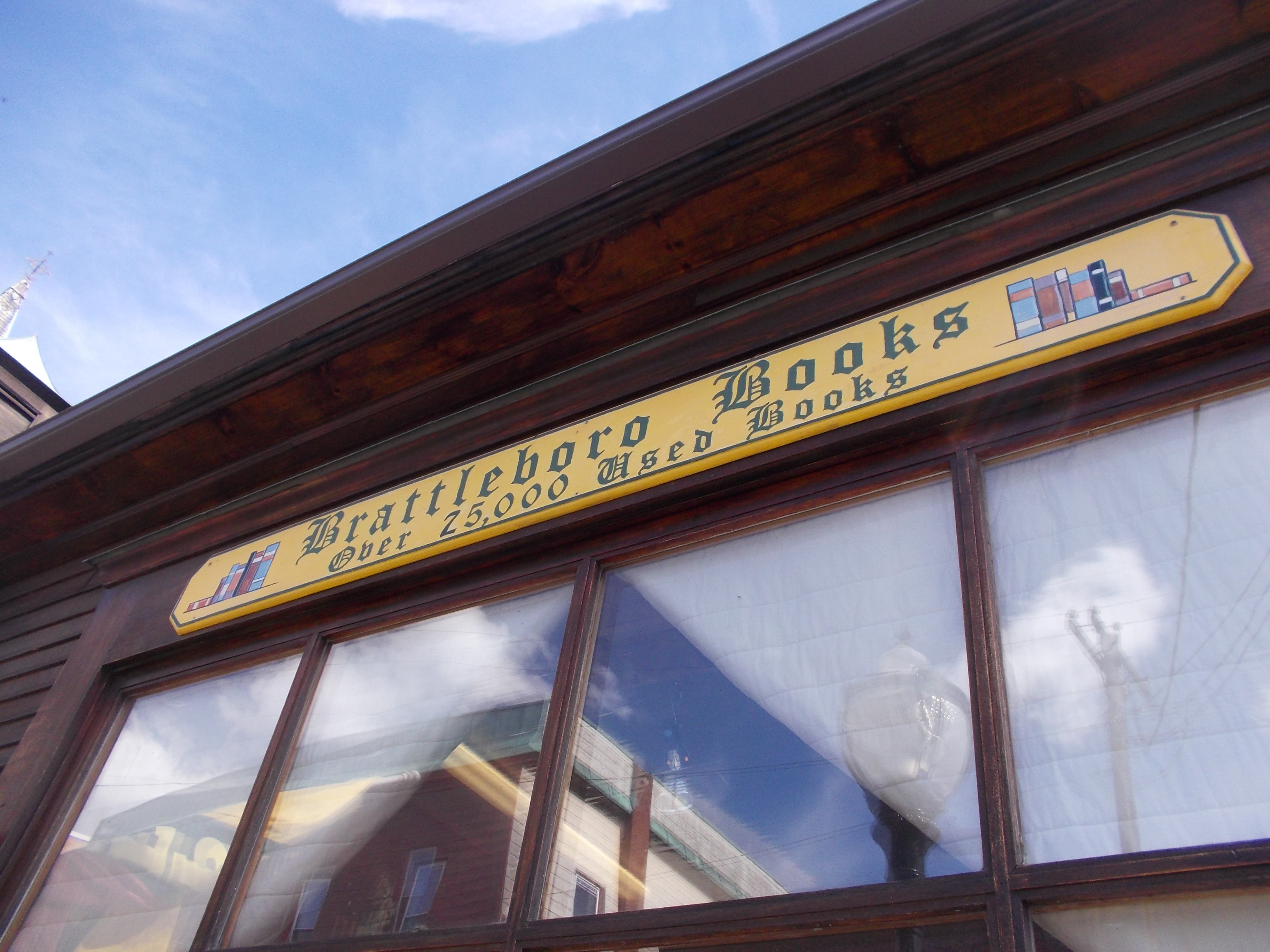 Brattleboro Books Over 25000 Used Books. reflection in glasss. photo Jen Austin