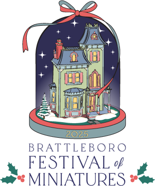 Ornament of a Victorian doll house with snow around and stars in the background