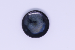 Miniature dark blue glazed ceramic plates, 1 ½” 