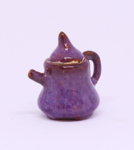 Miniature purple glazed ceramic pitcher, 1 ⅜” x 1 ½” x 1